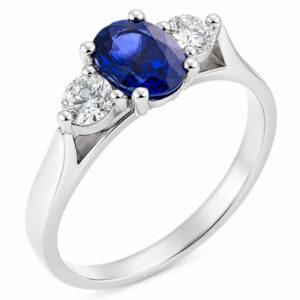 modern classic trilogy ring Oval blue sapphire shape round brilliant cut diamond platinum gold four three claw set