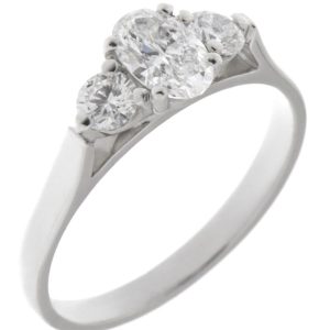 modern classic trilogy ring Oval shape round brilliant cut diamond platinum gold four three claw set