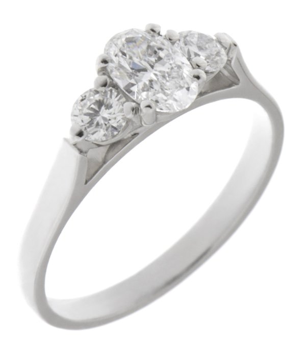 modern classic trilogy ring Oval shape round brilliant cut diamond platinum gold four three claw set