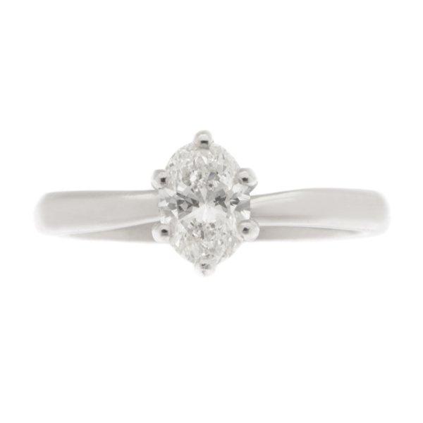 A modern 4 four claw classic solitaire twist compass set style oval shape cut diamond engagement ring lab grown platinum gold