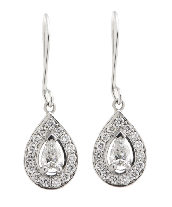 Classic art deco style drop earrings with a pear shape main diamond and a halo of round brilliant cut diamonds platinum gold