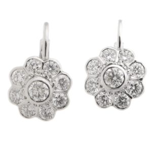 Diamond cluster drop style earrings round brilliant cut diamonds surround larger centre diamond daisy flower style setting white gold