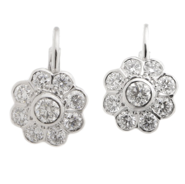 Diamond cluster drop style earrings round brilliant cut diamonds surround larger centre diamond daisy flower style setting white gold