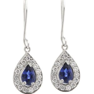 Classic art deco style Blue Sapphire drop earrings with pear shape main sapphires and a halo of round brilliant cut diamonds platinum gold