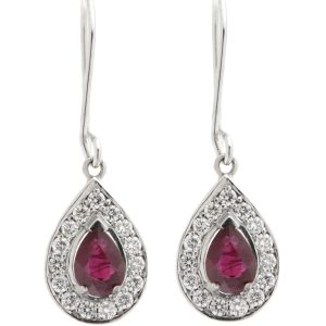 Classic art deco style Ruby drop earrings with pear shape main Rubies and a halo of round brilliant cut diamonds platinum gold
