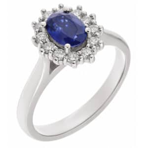Crystal classic oval shape cut blue sapphire with round brilliant cut diamond halo cluster claw set ring platinum gold
