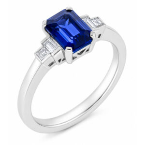 Classic deco style modern ring emerald step cut blue Sapphire centre stone stepped graduated baguette cut diamond platinum gold