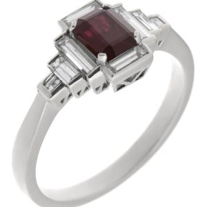 Classic art deco style modern ring emerald step cut Ruby centre stone stepped baguette cut diamonds cluster setting platinum gold