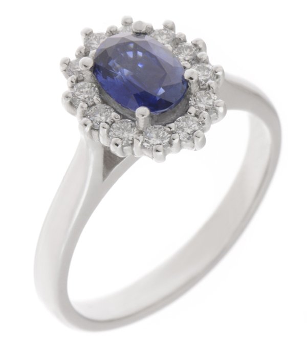 Crystal classic oval shape cut blue sapphire with round brilliant cut diamond halo cluster claw set ring platinum gold