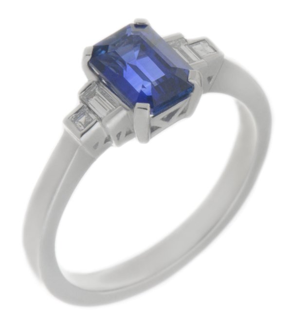 Classic art deco style modern ring emerald step cut blue Sapphire centre stone stepped graduated baguette cut diamond shoulders platinum gold