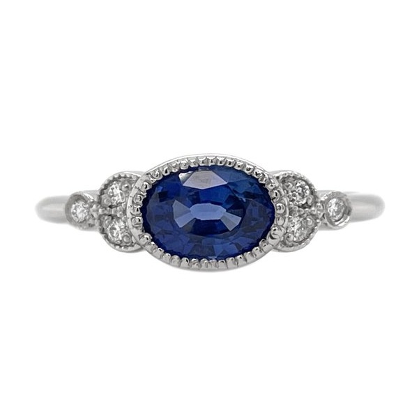 Classic art deco vintage style ring oval shape blue sapphire round diamond millgrain engagement cluster platinum gold