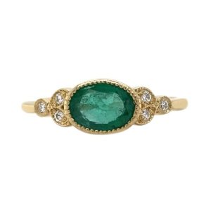 Classic art deco vintage style ring oval shape green emerald round diamond millgrain engagement cluster platinum gold