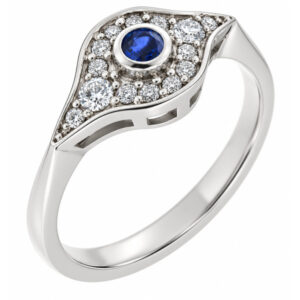 classic 1920's art deco design blue sapphire cluster ring rubover grain set surround round shape brilliant cut diamonds platinum gold