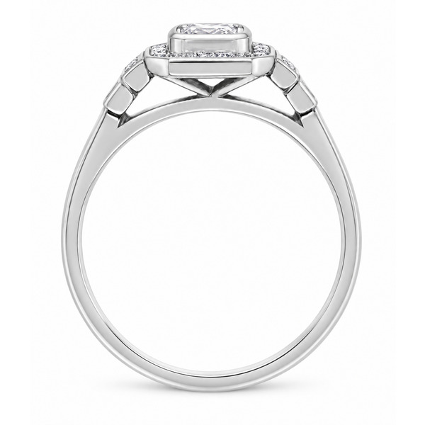 Classic 1920's art deco style emerald cut Diamond halo ring round brilliant cut diamonds surround stepped shoulders platinum gold