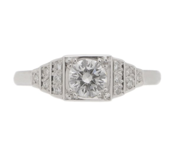 classic 1920's art deco style engagement ring round brilliant cut diamond square diamonds stepped platinum gold