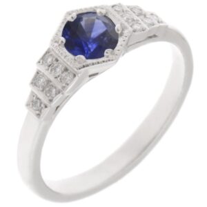 Classic 1920's art deco style engagement ring round blue sapphire hexagon set diamond stepped shoulders platinum gold