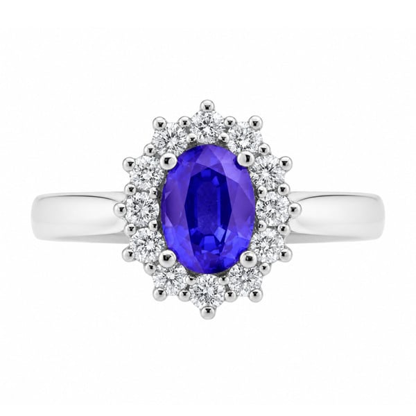 Crystal classic oval shape cut Tanzanite with round brilliant cut diamond halo cluster claw set ring platinum gold