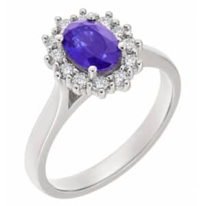 Crystal classic oval shape cut Tanzanite with round brilliant cut diamond halo cluster claw set ring platinum gold