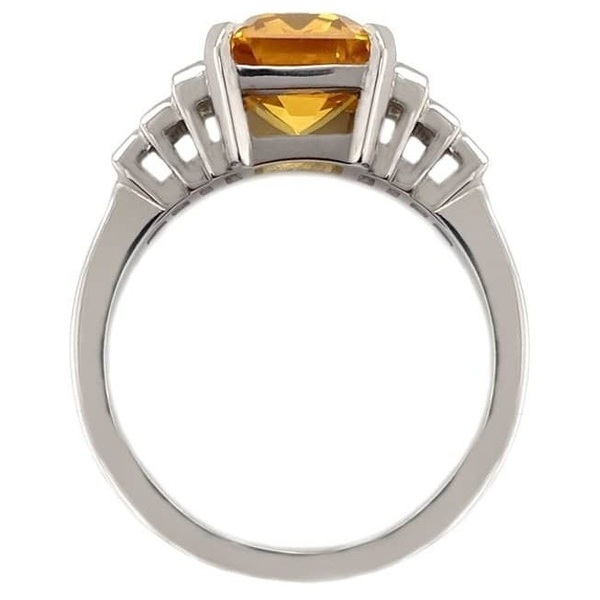 Art Deco style octagon step emerald cut yellow Sapphire baguette Diamond ring Platinum.