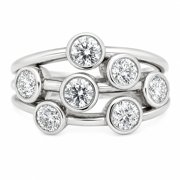 Modern contemporary organic scatter bubble style cluster ring rubbed over round brilliant cut diamond platinum gold