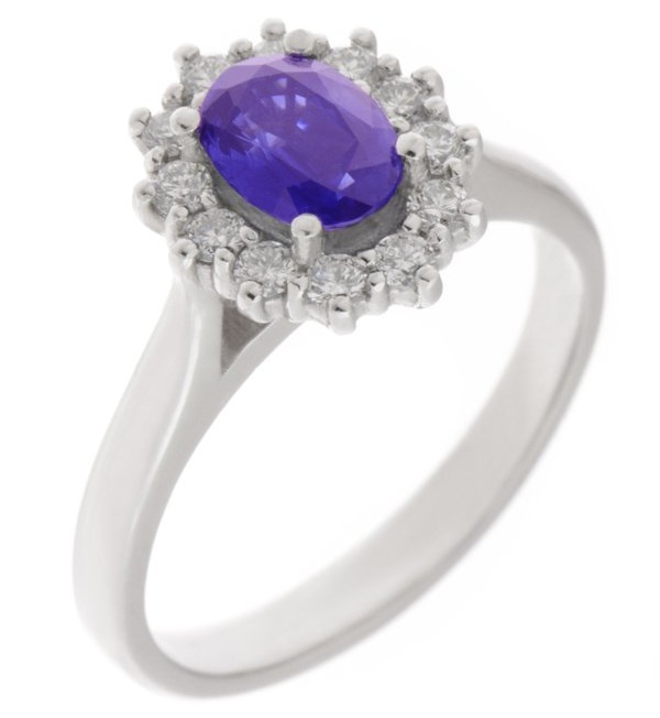 Crystal classic oval shape cut Tanzanite with round brilliant cut diamond halo cluster claw set ring platinum gold
