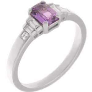 1920's Art Deco style ring octagon shaped emerald step cut purple sapphire stone baguette diamonds shoulders platinum gold