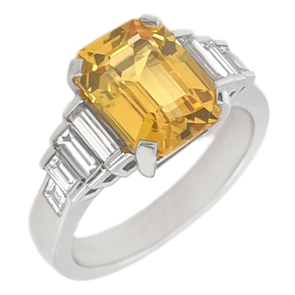 Art Deco style octagon step emerald cut yellow Sapphire baguette Diamond ring Platinum.