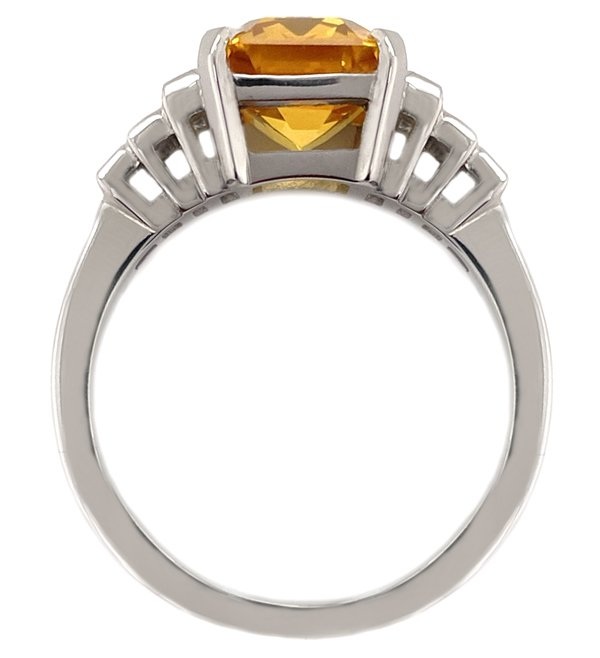 Art Deco style octagon step emerald cut yellow Sapphire baguette Diamond ring Platinum.
