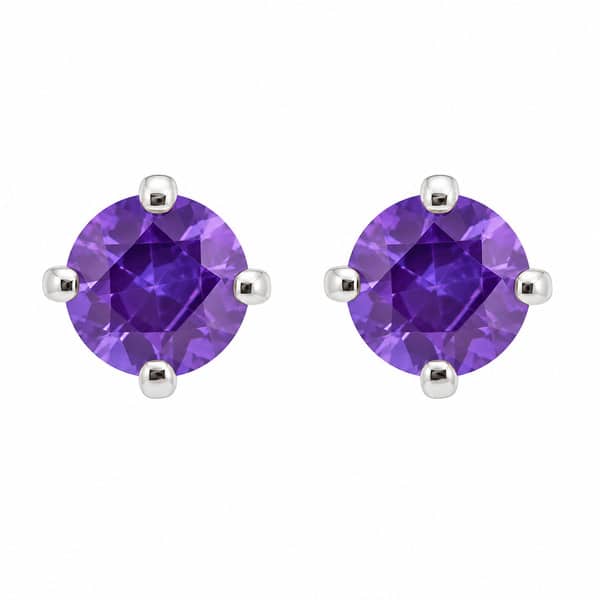 Four claw stud or solitaire style earrings round shape cut tanzanite tanzanites platinum gold