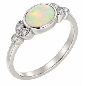 Art deco vintage style oval shape water opal round brilliant cut diamond trefoil cluster style ring platinum gold