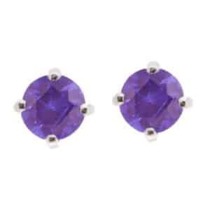 Four claw stud or solitaire style earrings round shape cut tanzanite tanzanites platinum gold