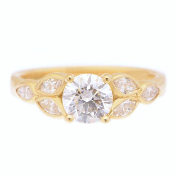 Round brilliant cut diamond solitaire engagement ring with marquise cut petal floral organic shoulders Platinum Gold