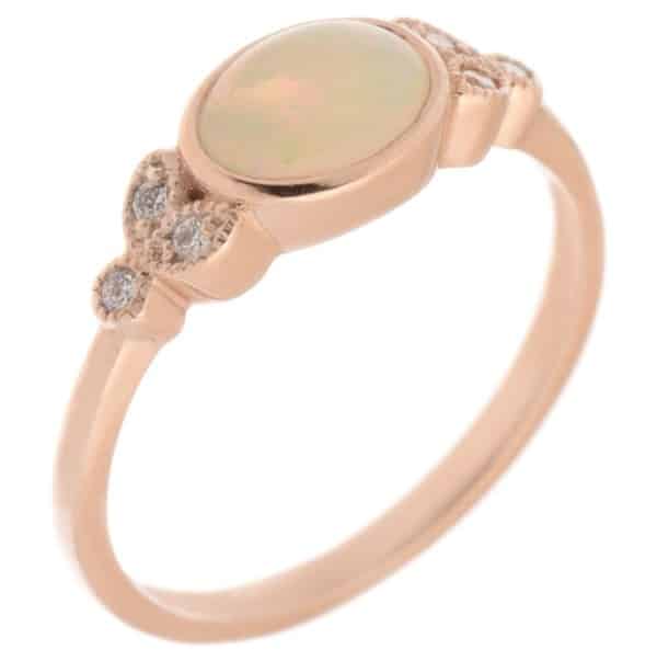 Art deco vintage style oval shape water opal round brilliant cut diamond trefoil cluster style ring platinum gold