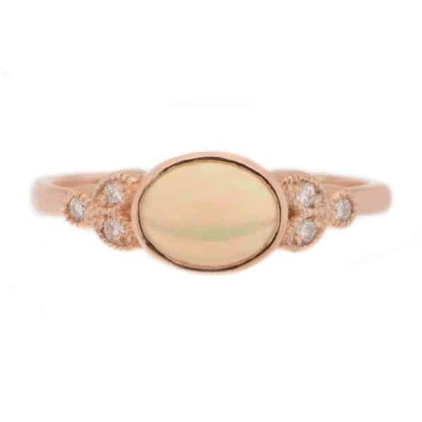 Art deco vintage style oval shape water opal round brilliant cut diamond trefoil cluster style ring platinum gold