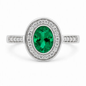 classic oval shape cut rubbed over rubover green emerald round brilliant cut diamonds halo cluster grain set engagement ring platinum gold