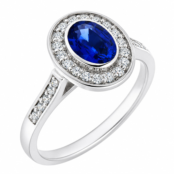 classic rubover rubbed over oval shape cut blue sapphire round brilliant cut diamonds halo cluster grain set engagement ring platinum gold