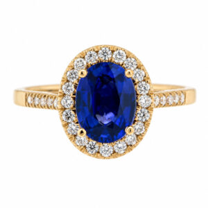classic oval shape cut blue sapphire with round brilliant cut diamonds halo cluster claw set ring platinum gold