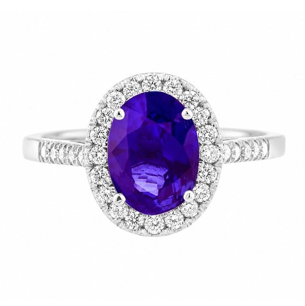 classic oval shape cut tanzanite with round brilliant cut diamonds halo cluster claw set ring platinum gold