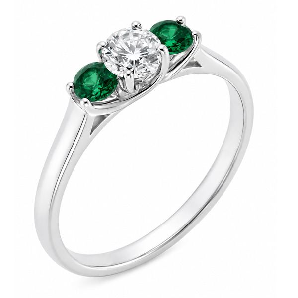 classic trilogy style ring round diamond centre stone & two green emerald side stones claw set setting gold platinum