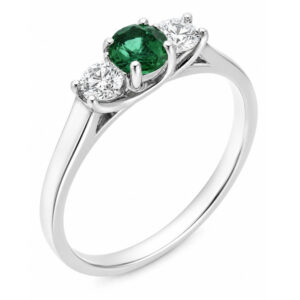 classic trilogy style ring round green emerald centre stone & two round brilliant cut diamonds claw set setting gold platinum
