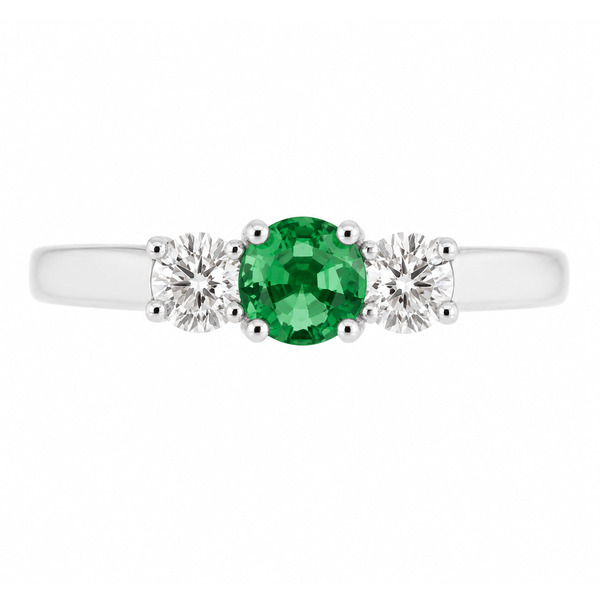 classic trilogy style ring round green emerald centre stone & two round brilliant cut diamonds claw set setting gold platinum