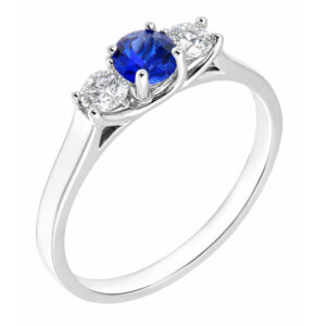 classic trilogy style ring round blue sapphire centre stone & two round brilliant cut diamonds claw set setting gold platinum