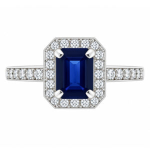 classic Art Deco style cluster ring with emerald cut centre Blue Sapphire claw setting grain set round brilliant cut diamonds set shoulders halo surround platinum gold