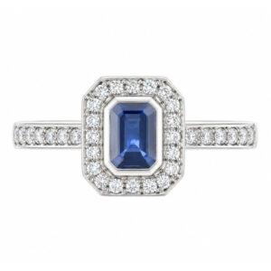 classic Art Deco style cluster ring with emerald cut centre Blue Sapphire rubover setting grain set round brilliant cut diamonds set shoulders halo surround platinum gold