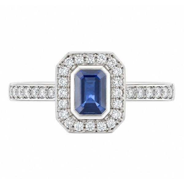 classic Art Deco style cluster ring with emerald cut centre Blue Sapphire rubover setting grain set round brilliant cut diamonds set shoulders halo surround platinum gold