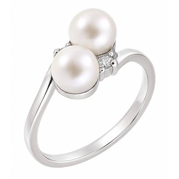 modern crossover style ring with two round freshwater cultured white pearls two round brilliant cut diamonds. platinum gold
