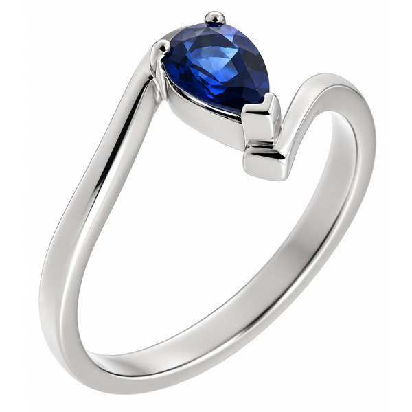 A modern crossover, wrap around style ring with a claw set solitaire pear cut shape blue sapphire contemporary design designer platinum gold