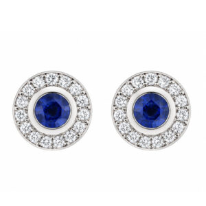 Classic cluster style earrings with a rubover set central round blue sapphire with a halo of grain set round brilliant cut diamonds platinum gold