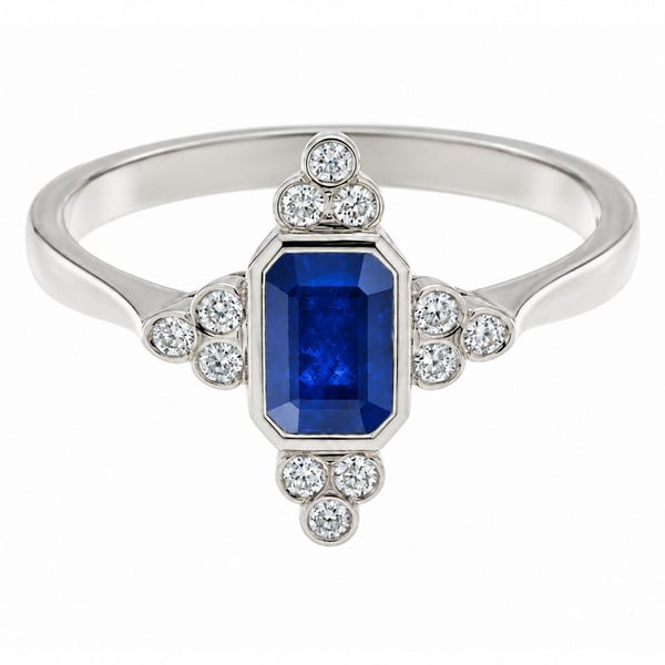classic art deco cluster style ring with octagon shaped or emerald, step cut blue sapphire centre stone, trilogy clusters of round brilliant cut diamonds top bottom sides platinum gold