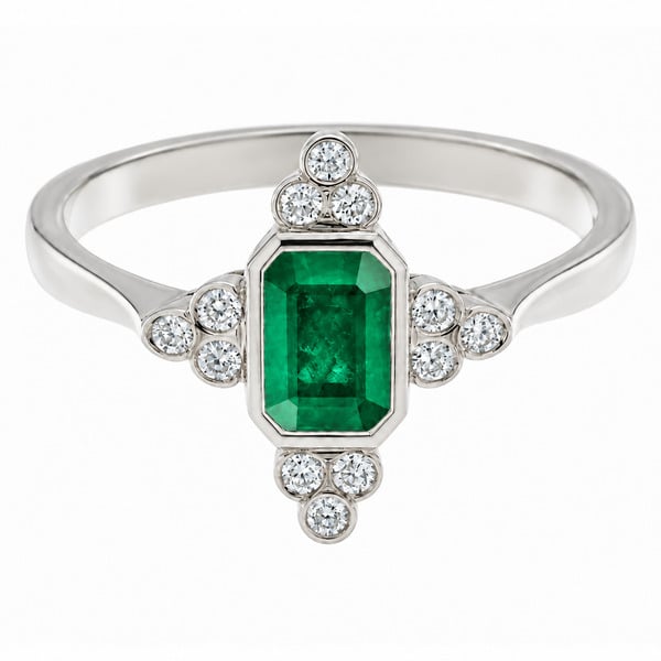 classic art deco cluster style ring with octagon shaped or emerald, step cut green emerald centre stone, trilogy clusters of round brilliant cut diamonds top bottom sides platinum gold
